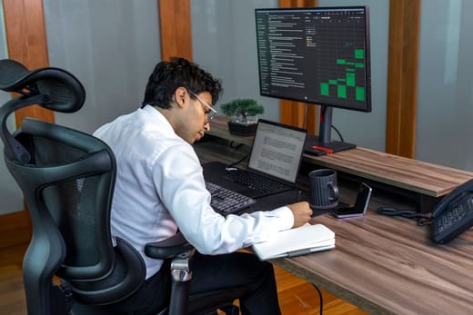 An analyst at a data dashboard