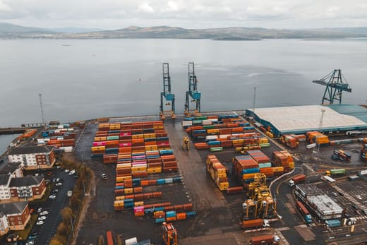 A container port on an estuary, seen from above